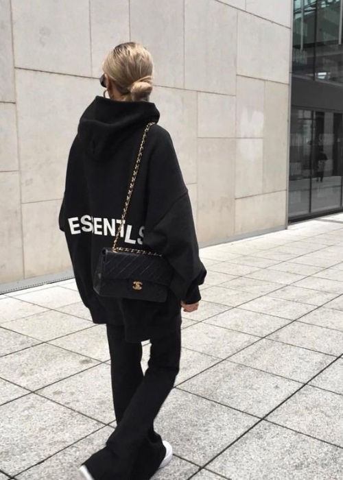 Black hoodie and black leather thin jeans together